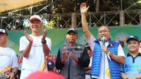 Menteri Perdagangan Zulkifli Hasan menghadiri kegiatan jalan sehat Pra Perhelatan Muktamar Muhammadiyah dan ‘Aisyiyah ke 48 bersama Gubernur Jawa Tengah Ganjar Pranowo