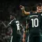 Carlos Espi Escrihuela merayakan gol ketiga Real Madrid bersama Kylian Mbappe dalam pertandingan La Liga melawan Elche di Stadion Martinez Valero, Elche, Spanyol, Rabu (16/9/2026) dini hari WIB. (Jose Jordan / AFP)