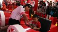 Anak-anak bermain saat peringatan Hari Anak Nasinonal di Taman Prestasi, Jakarta, Minggu (21/7/2019). Peringati Hari Anak Nasional SGM Eksplor hadirkan "Taman Prestasi Sahabat Generasi Maju" untuk mendukung asah potensi prestasi si Kecil Jadi anak Generasi Maju. (Liputan6.com/Johan Tallo)