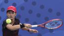 Ganda Indonesia, Priska Nugroho / Rifanty Kahfiani, saat melawan Peangtarin Plipuech / Tamarine Tanasugarn pada SEA Games 2019 di Kompleks Rizal Memorial, Kamis (5/12). Ganda Indonesia kalah 4-6, 7-6 dan 5-10. (Bola.com/M Iqbal Ichsan)
