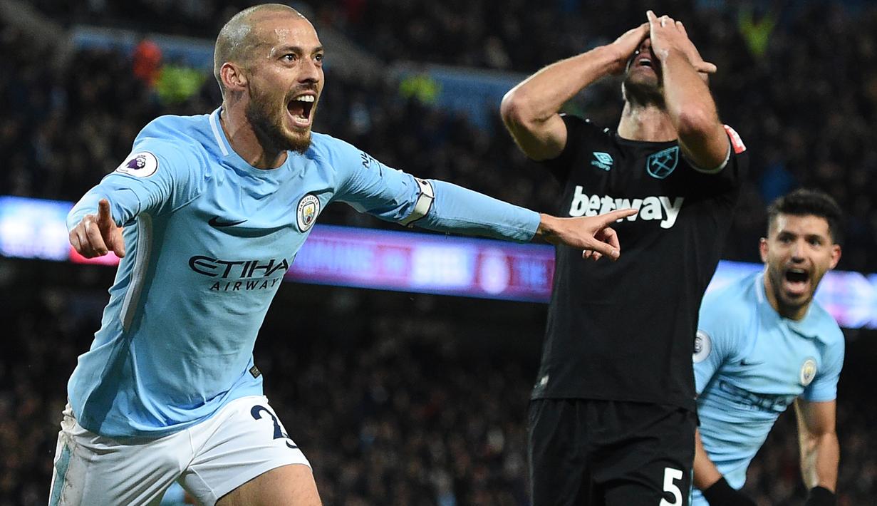 David Silva (kiri) mengisi posisi kedelapan dari deretan top scorer Manchester City, Silva total mengoleksi tiga gol untuk timnya disemua level kompetisi. (AFP/Oli Scarff)