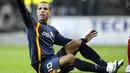 Sevilla's Luis Fabiano Clemente gestures from the ground during their UEFA Cup group C football match against Standard de Liege in Liege on November 06, 2008. AFP PHOTO JOHN THYS 