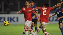 Bek Timnas Indonesia, Mohammad Nasuha, mencetak gol ke gawang Malaysia pada final Piala AFF 2010.(AFP/Bay Ismoyo)
