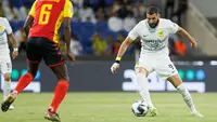 Pada pertandingan ini, Karim Benzema diduetkan bareng Abderazak Hamdalah di depan dengan ditopang Jota dan Romarinho. (AFP Photo)