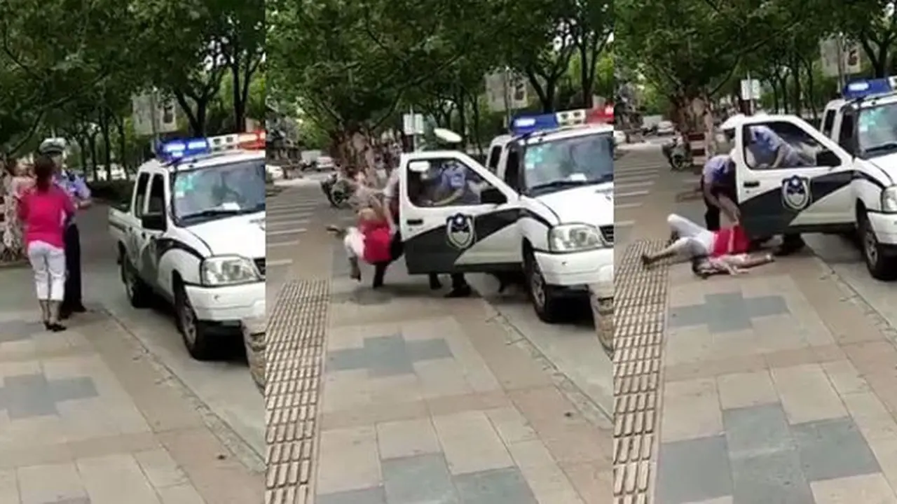 Polisi Banting Ibu dan Anak ke Trotoar.