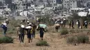 Sementara itu, Israel terus menolak seruan internasional untuk melakukan gencatan senjata dan terus melancarkan serangan di Gaza sejak 7 Oktober 2023 yang menewaskan lebih dari 60.000 warga Palestina, didominasi perempuan dan anak-anak, serta melukai 145.870 lainnya. (Eyad BABA/AFP)