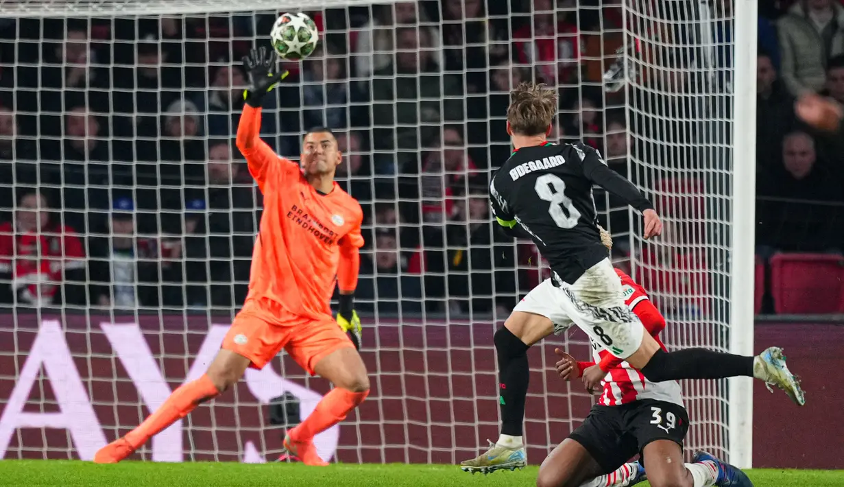 Tujuh gol kemenangan Arsenal masing-masing dicetak Jurrien Timber, Ethan Nwaneri, Mikel Merino, Martin Odegaard (2 gol), Leandro Trossard, dan Riccardo Calafiori. PSV sempat memperkecil ketinggalan lewat penalti Noa Lang. (AP Photo/Peter Dejong)