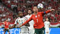 Cristiano Ronaldo (kanan) saat Timnas Portugal kalahkan Hungaria. (Attila KISBENEDEK / AFP)