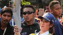 Kedatangan obor Asian Games disambut meriah oleh ribuan warga kota Surakarta tanpa pandang usia. Paras cantik Dian Sastro pembawa obor menarik perhatian masyarakat yang menyaksikan Rangkaian Torch Relay Asian Games 2018.