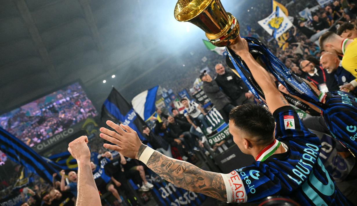 Kesuksesan ini sekaligus menjadi "penebus dosa" Inter Milan setelah nir gelar pada musim lalu. (AFP/Isabella Bonotto)