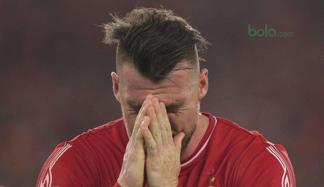 Ekspresi Marko Simic usai membobol gawang JDT pada laga grup H Piala AFC 2018 di Stadion Utama Gelora Bung Karno, Jakarta, Selasa (10/4/2018). Persija Jakarta menang 4-0.  (Bola.com/Nick Hanoatubun)
