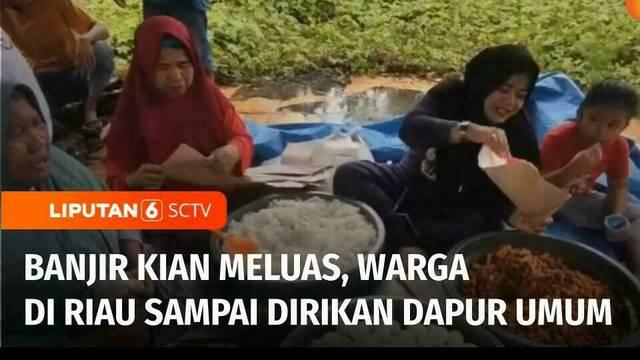Banjir luapan Sungai Batang Lubuh, Rokan Hulu, Riau, kian meluas hingga merendam ratusan rumah warga. Untuk memenuhi kebutuhan sehari-hari bagi para korban, warga mendirikan dapur umum.