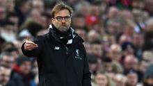 Ekspresi Jurgen Klopp menyaksikan laga Liverpool vs Arsenal, Minggu (5/3/2017). (PAUL ELLIS / AFP)