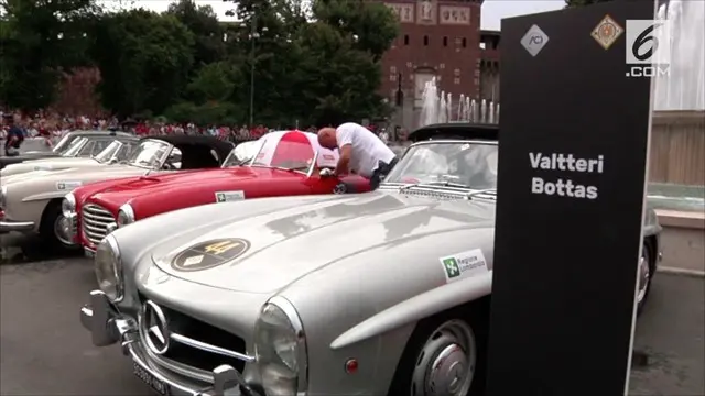 Sejumlah bintang F1 menghadiri parade mobil klasik di ruas jalan Milan. Tampak sederet mobil klasik seperti Alpha Romeo, Renault, dan Ferrari