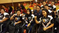 Menpora Zainudin Amali bersama dengan para atlet angkat berat yang akan berlaga pada ASEAN Para Games 2020 di Filipina.(Liputan6.com/Fajar Abrori)