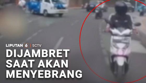 Dijambret saat akan Menyeberang