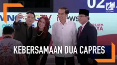 Suasana hangat masih terjalin setelah debat, kedua capres masih berpelukan dan menyempatkan selfie bareng dengan para moderator.