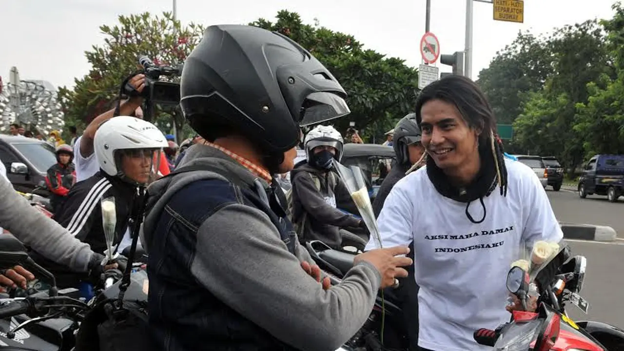 Aksi damai Charly van Houten di depan Istana Negara (Liputan6.com/Panji Diksana)