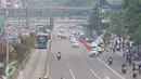 Suasana jalan lengang di kawasan bundaran HI, Jakarta, Jumat (4/11). Kawasan tersebut yang biasanya padat lalu lintas menjadi lengang akibat adanya Aksi Damai 4 November. (Liputan6.com/Angga Yuniar)