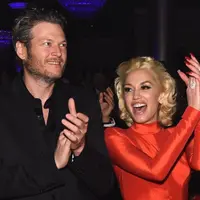 Tujuan Gwen memakai baju yang agak besar nampaknya bertujuan untuk menutupi perut buncitnya. Di klinik kesuburan itu, pasangan ini menghabiskan waktu yang cukup lama untuk berkonsultasi. (AFP/Larry Busacca)