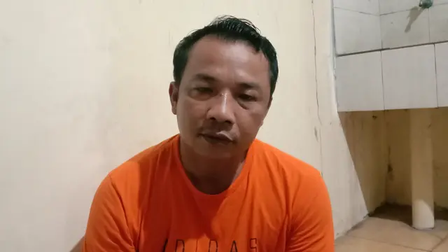 Cepi Hanapi, Sopir Taxi Online Yang Melawan Empat Pembegalnya. (Kamis, 20/05/2021). (Liputan6.com/Yandhi Deslatama).