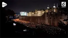 Sekitar 10.000 api obor dinyalakan di London, Inggris. Instalasi yang bertajuk Beyond The Deepening Shadow ini menandai seratus tahun berakhirnya Perang Dunia I.