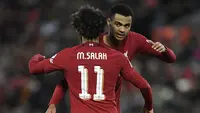 Liverpool gagal memetik hasil maksimal saat menjamu Wolverhampton Wanderers pada laga putAran ketiga Piala FA 2022/2023 yang berlangsung di Anfield Stadium, Minggu (8/1/2023) dini hari WIB. The Reds harus puas bermain imbang 2-2 dalam laga yang diwarnai debut rekrutan anyar mereka Cody Gakpo. (AFP/Oli Scarff)