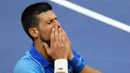 Ekspresi petenis Serbia Novak Djokovic usai mengalahkan petenis Rusia Daniil Medvedev pada final tunggal putra kejuaraan tenis US Open 2023 di New York, Amerika Serikat, Minggu (10/9/2023). (AP Photo/Mary Altaffer)