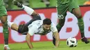 Striker Argentina, Sergio Aguero, terjatuh saat berebut bola dengan pemain Nigeria pada laga persahabatan di Stadion FK Krasnodar, Rabu (15/11/2017). Argentina kalah 2-4 dari Nigeria. (AP/Sergey Pivovarov)