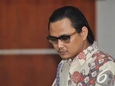 Riefan Avrian saat menjalani sidang vonis di Pengadilan Tipikor, Jakarta, Rabu (17/12/2014). (Liputan6.com/Miftahul Hayat)