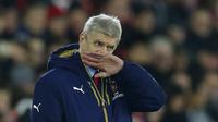 Pelatih Arsenal, Arsene Wenger, mengunhgkapkan alasan kekalahan 0-4 timnya melawan Southampton, Minggu (27/12/2015) dini hari WIB. (Reuters/Carl Recine)