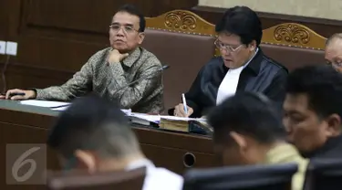 Mantan Panitera Pengadilan Negeri Jakarta Pusat Edy Nasution menjalani sidang dengan agenda mendengarkan keterangan empat saksi di Pengadilan Tipikor, Jakarta, Rabu (14/9). (Liputan6.com/Helmi Afandi)