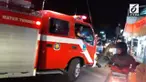 Mobil pemadam kebakaran terjebak arus bali sehingga tidak bisa sampai ke lokasi kebakaran.