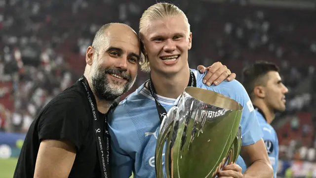 Pep Guardiola dan Erling Haaland