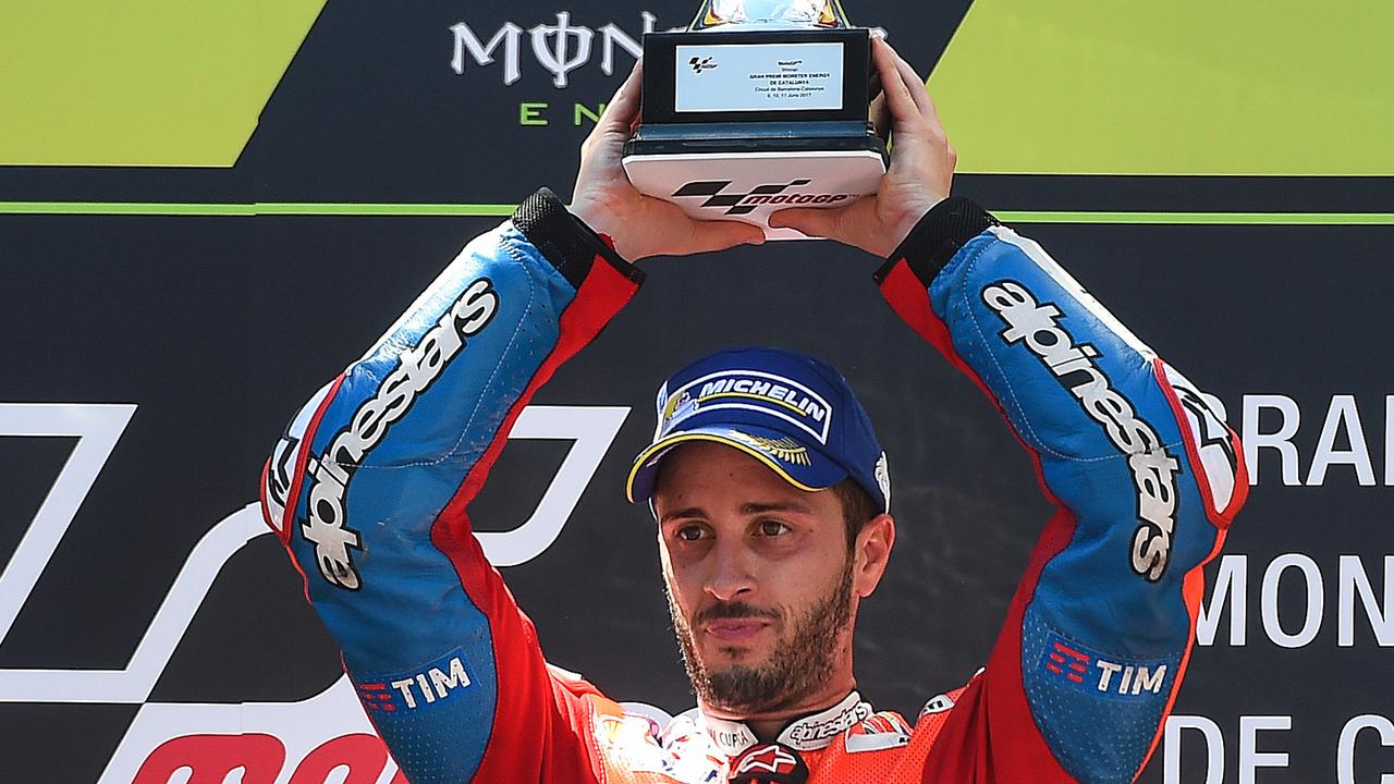 Pembalap Ducati, Andrea Dovizioso, rayakan kemenangan di MotoGP Catalunya, akhir pekan lalu.