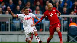 Jonas Hector (kiri), penampilan apiknya bersama FC Koln membuat klub-klub besar Eropa tertarik. (Reuters/Michael Dalder)