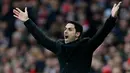 Pelatih Arsenal Mikel Arteta saat Arsenal melawan West Ham pada pertandingan Liga Inggris di Emirates Stadium, London, 7 Maret 2020. Setelah dinyatakan positif virus corona COVID-19, Arsenal meminta mereka yang akhir-akhir ini berhubungan dengan Arteta untuk mengisolasi diri. (Ian KINGTON/AFP)