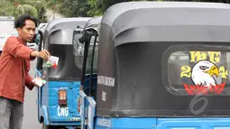 Salah satu pengunjuk rasa membagikan stiker saat aksi di Megaria, Jakarta, Jumat, (24/4/2015). Pengunjuk rasa mengkritisi sistem peradilan yang tidak transparan dan tidak independen dalam memberikan hukuman mati. (Liputan6.com/Helmi Afandi)