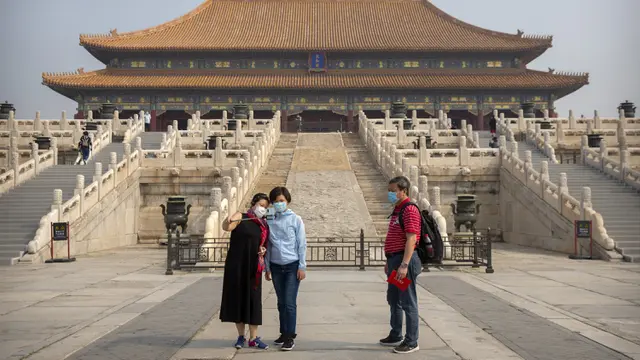 FOTO: Corona Mereda, Kota Terlarang China Kembali Dibuka