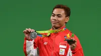 Indonesia meraih medali kedua di ajang Olimpiade Rio de Janeiro 2016 setelah lifter Eko Yuli Irawan menyabet medali perak di cabang angkat besi kelas 62 kg, Selasa (9/8/2016) pagi WIB. (AFP/Goh Chai Hin)
