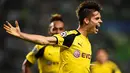 Ekspresi Julian Weigl setelah mencetak gol kedua Borussia Dortmund ke gawang Sporting CP dalam laga Grup F Liga Champions di Stadion Jose Alvalade, Lisbon, Rabu (19/10/2016) dini hari WIB. (AFP/Patricia De Melo Moreira)