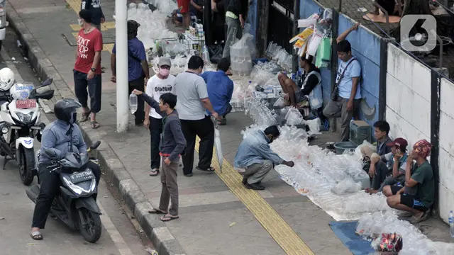 FOTO: Pemprov DKI Denda Rp 250 Ribu Bagi Warga Tak Pakai Masker