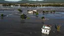 Otoritas setempat menyatakan sedikitnya 14 orang tewas, sementara 33 lainnya masih hilang. (I-Hwa Cheng/AFP)