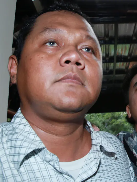 Saiful berusaha tegar menghadapi kasusnya. Kesedihan raut mukanya terlihat jelas. (Deki Prayoga/Bintang.com)