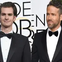 Ryan Reynolds dan Andrew Garfield berciuman di Golden Globes 2017. (AFP/Bintang.com)