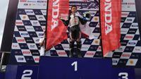 Pembalap binaan Astra Honda Motor (AHM), Herlian Dandi, memenangi balapan pertama pada ajang Thailand Talent Cup (TTC) seri kelima di Chang International Circuit, Buriram, Thailand, Sabtu (7/9/2019). (Media AHM)