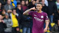 Gaya selebrasi Gabriel Jesus usai mencetak satu gol ke gawangWatford  (AFP/Ben Stansall)