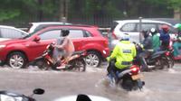 Hujan kembali mengguyur Jakarta. Banjir dan macet pun terjadi lagi. (TMC Polda Metro Jaya)