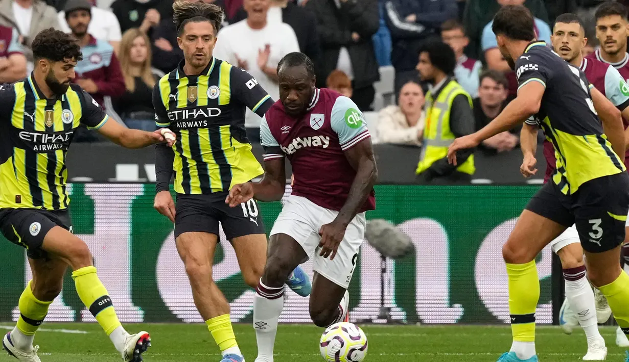 West Ham United sempat menunjukkan perlawanan, namun tim asuhan pelatih Pep Guardiola masih terlalu tangguh. (AP Photo/Frank Augstein)
