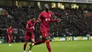 Pemain Liverpool Divock Origi melakukan selebrasi usai mencetak gol ke gawang Preston North End pada pertandingan Piala Liga Inggris di Stadion Deepdale, Preston, Inggris, 27 Oktober 2021. Liverpool menang 2-0. (AP Photo/Jon Super)